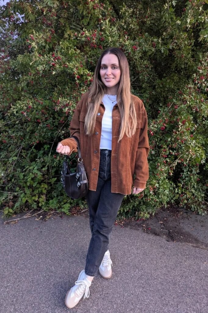 Brown Corduroy Shacket + White Ribbed Tee + Dark Grey Straight-Leg Jeans + White & Beige Sneakers