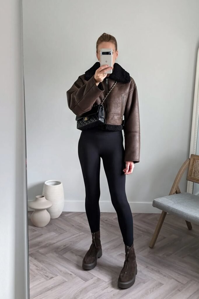 Brown Cropped Shearling Jacket + Black Leggings + Brown Zip-Front Platform Boots