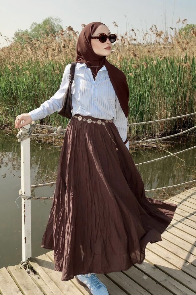 Brown Hijab + Blue Striped Button-Down + Brown Pleated Maxi Skirt + Blue Sneakers