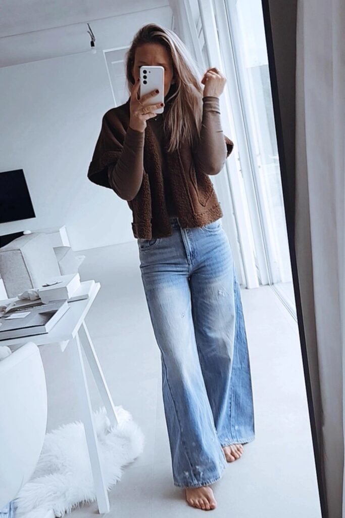 Brown Shearling Vest + Brown Long-Sleeve Layer + Wide-Leg Light Wash Jeans