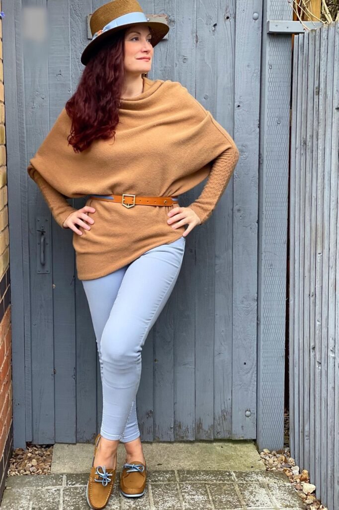 Black Leather Jacket + Neon Lime Crop Top + Light Wash Jeans + Off-White Sneakers