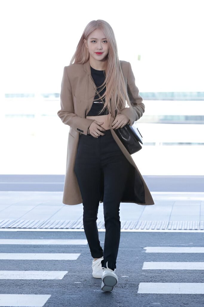 Camel Mid-Length Coat + Black Crop Top + Black Skinny Jeans + White Sneakers