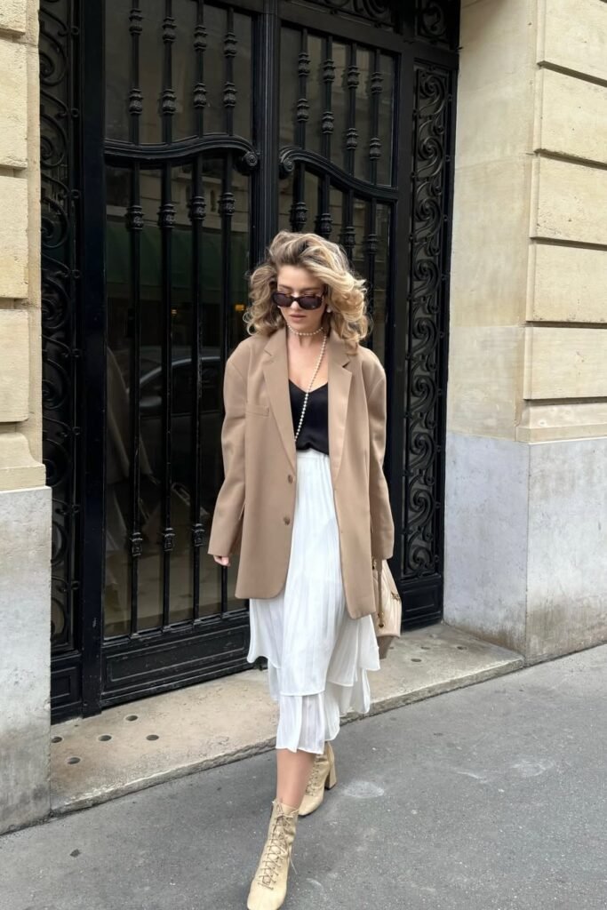 Camel Oversized Blazer + Black Camisole + White Tiered Midi Skirt + Cream Lace-Up Boots