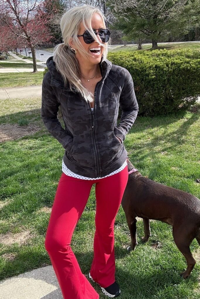 Camo Print Zip-Up Hoodie + Red Flared Leggings + Black Sneakers