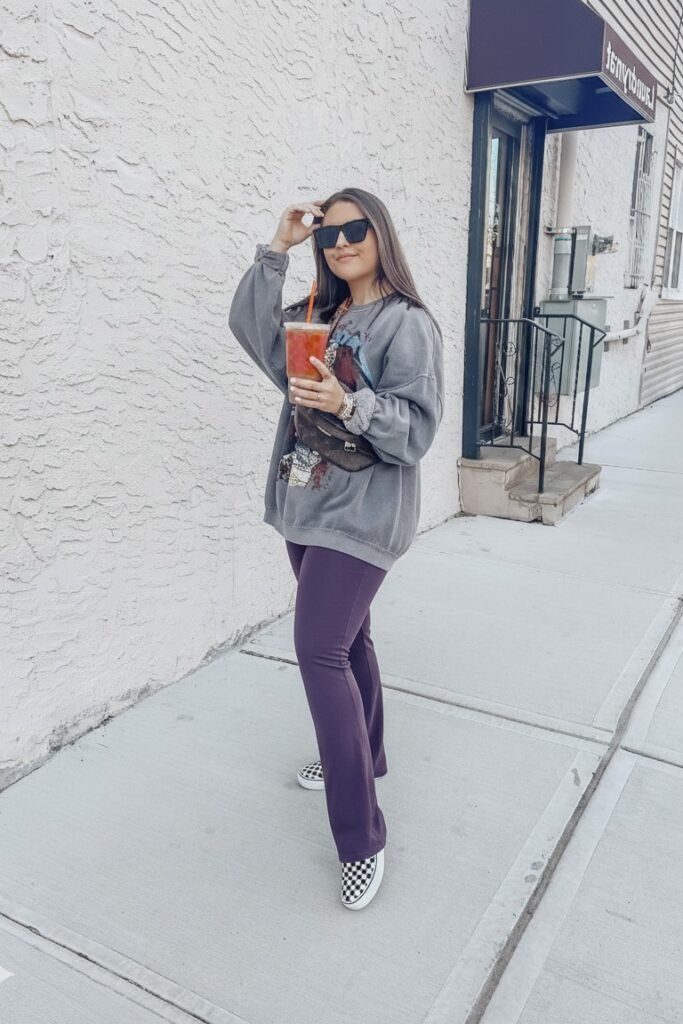 Charcoal Grey Graphic Sweatshirt + Dark Purple Flared Leggings + Checkerboard Slip-on Shoes