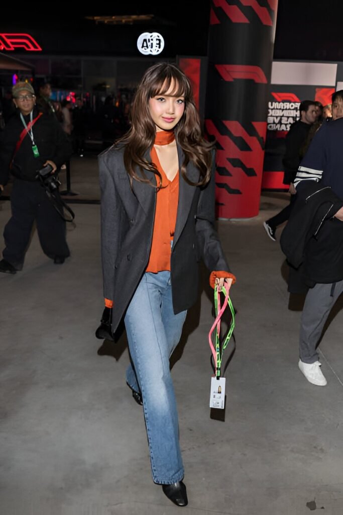 Charcoal Oversized Blazer + Burnt Orange Scarf-Neck Blouse + Blue Flare Jeans + Black Square-Toe Boots