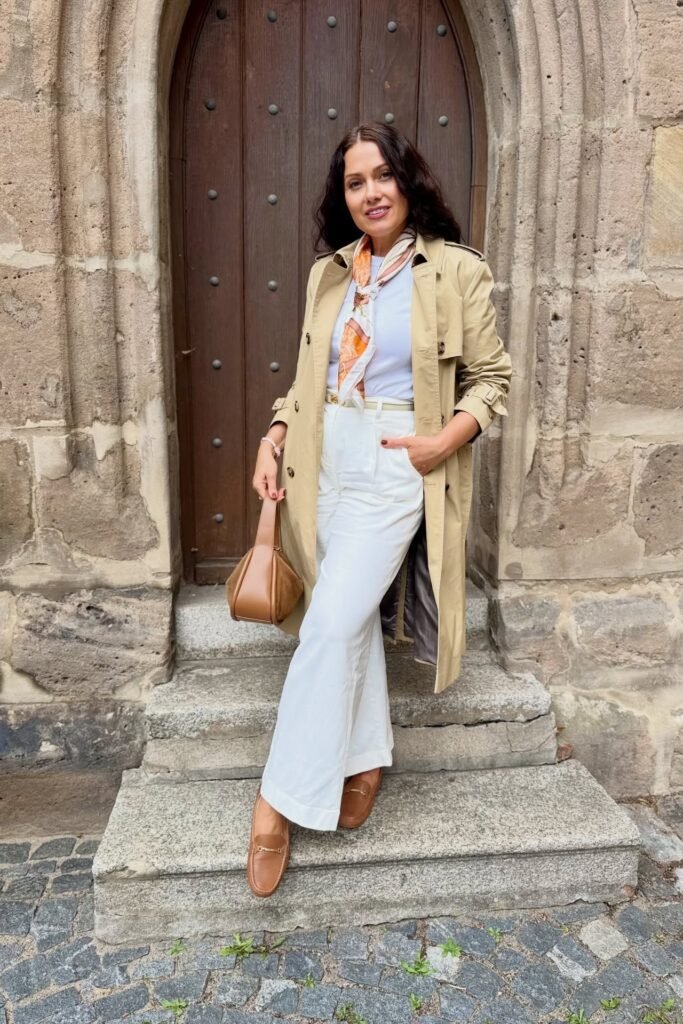 Classic Tan Trench Coat + White T-Shirt + White Wide-Leg Trousers + Tan Leather Loafers