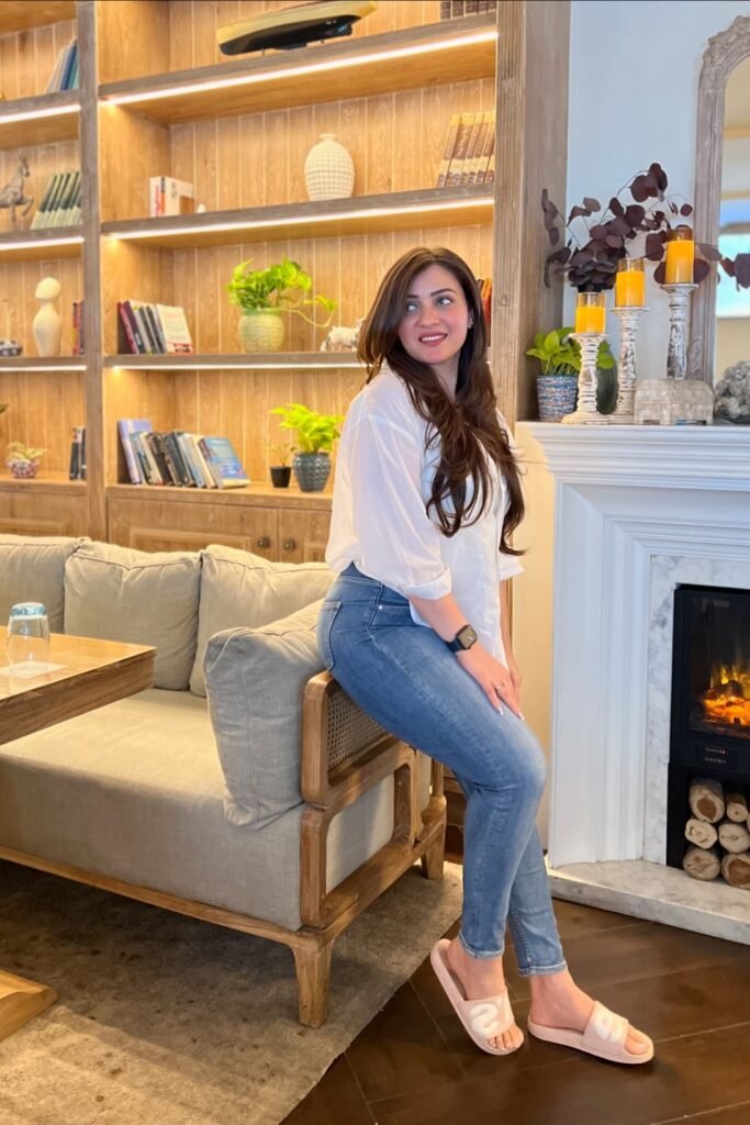 Classic White Button-Down + Mid-Wash Skinny Jeans + Pink Rubber Slides
