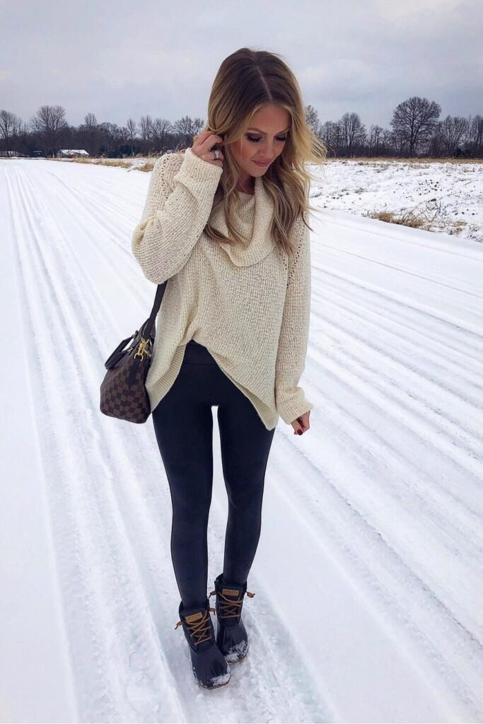 Cream Cowl-Neck Knit Sweater + Black Leggings + Black Duck Boots