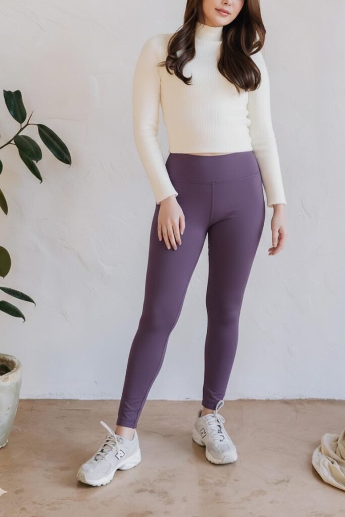 Cream Ribbed Turtleneck + Muted Purple Leggings + Grey Athletic Sneakers