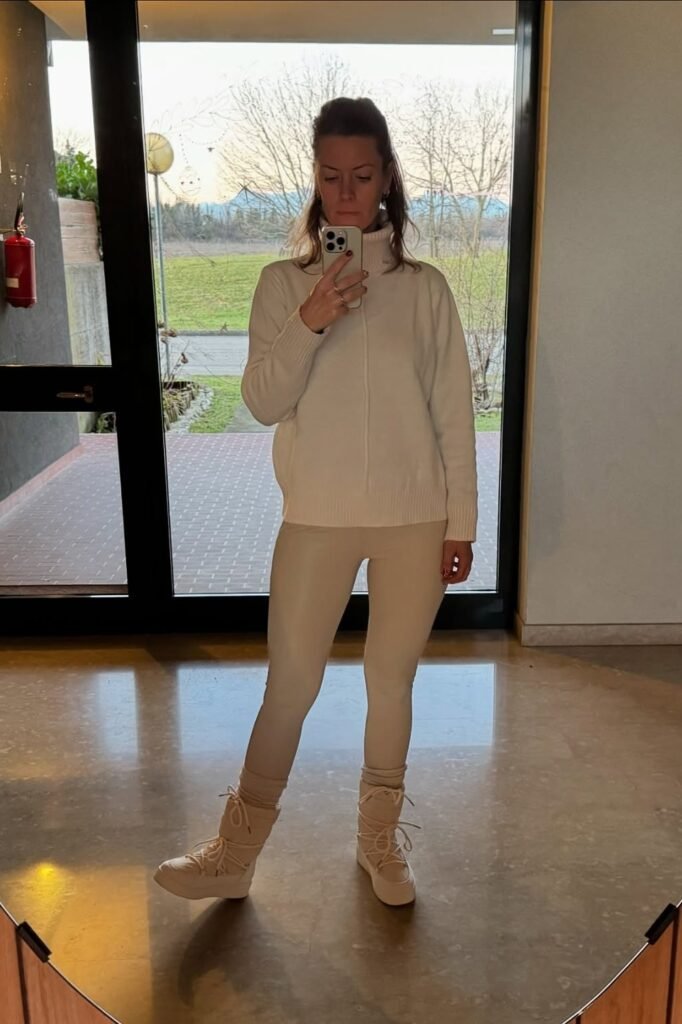 Cream Turtleneck Sweater + Beige Faux-Leather Leggings + Cream Lace-up Moon Boots