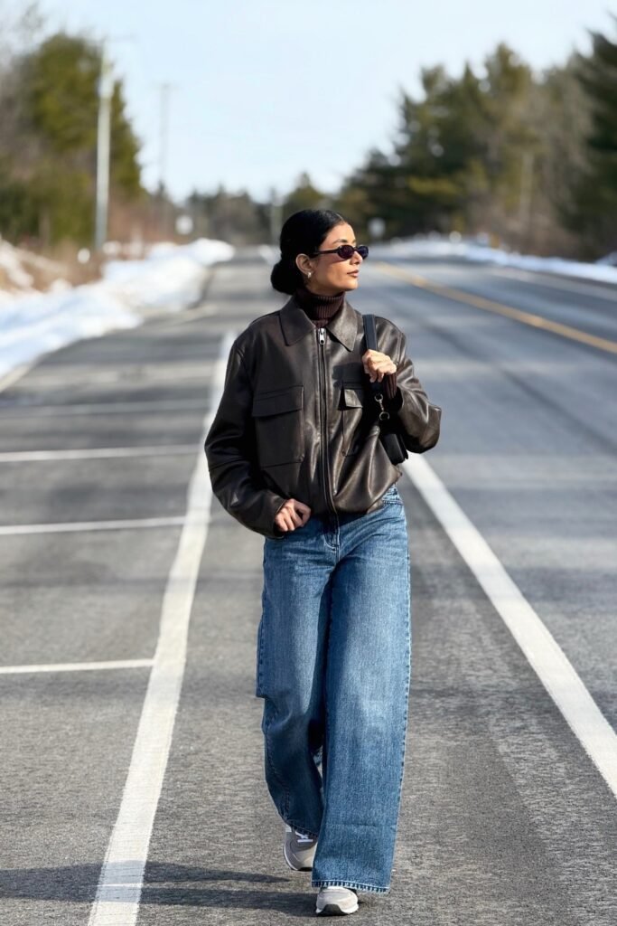Dark Brown Leather Work Jacket + Brown Turtleneck + Wide-Leg Blue Jeans