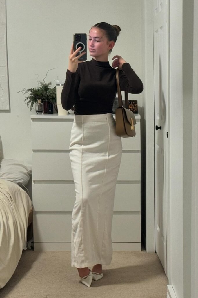 Dark Brown Mock-Neck Top + White Maxi Skirt + Brown Shoulder Bag + White Pointed Flats