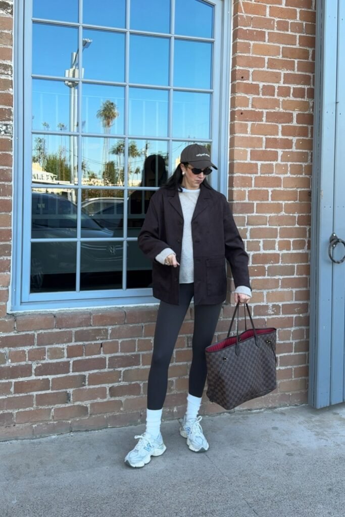 Dark Brown Utility Jacket + Grey Crewneck Sweater + Black Leggings + White Sneakers