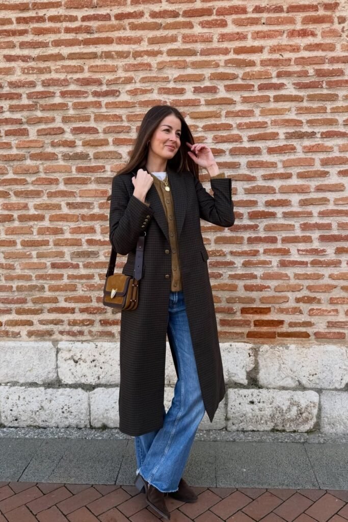 Dark Checkered Overcoat + Mustard Cardigan + Blue Wide-Leg Jeans + Brown Suede Boots