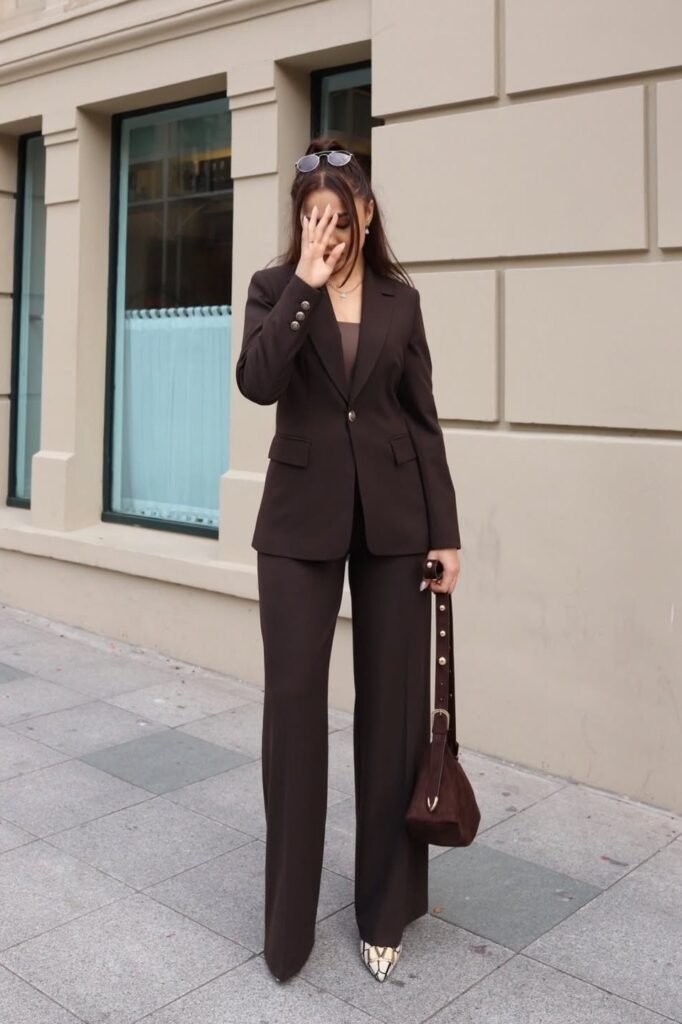 Dark Chocolate Brown Power Suit + Tonal Brown Bodysuit + Patterned Pointed-Toe Heels + Brown Suede Handbag