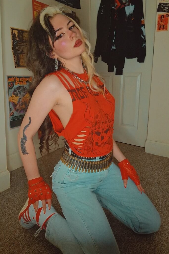 Distressed Red Graphic Tank + Light Wash Blue Jeans + Bullet Belt + Red Fingerless Gloves