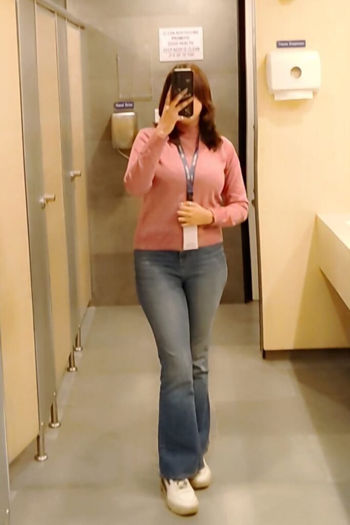 Dusty Pink Crewneck Sweater + Blue Flared Jeans + White Sneakers