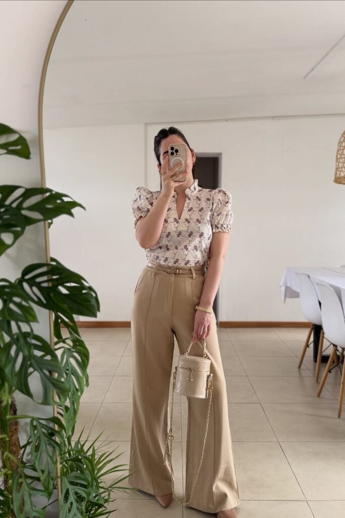 Floral Puff-Sleeve Blouse + Tan Wide-Leg Trousers + Tan Pointed Heels + White Vanity Bag