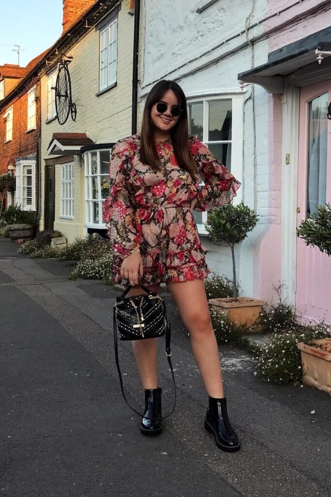 Floral Ruffled Romper + Black Patent Ankle Boots + Black Studded Handbag