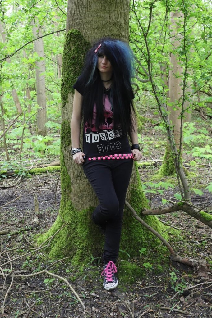 Graphic "But Cute" T-Shirt + Black Skinny Jeans + Pink Studded Belt + Black and Pink Sneakers