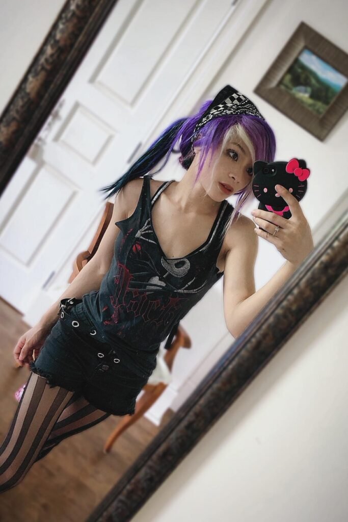 Graphic Skeleton Tank Top + Black Denim Shorts + Striped Tights