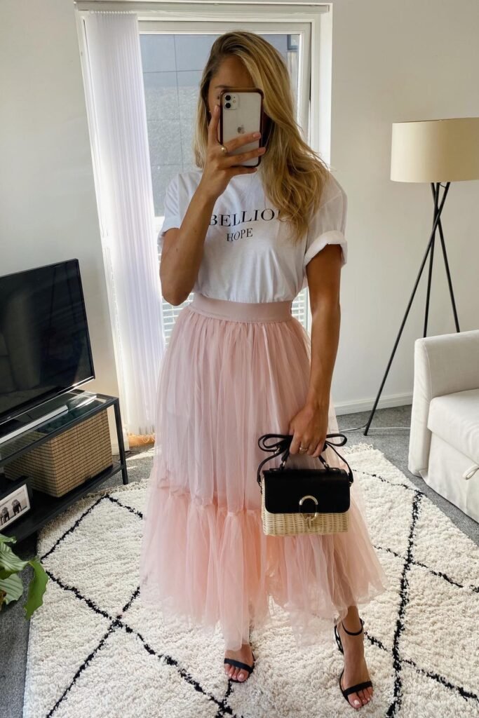 Graphic T-Shirt + Pink Tulle Maxi Skirt + Black Strappy Heels + Woven Handbag