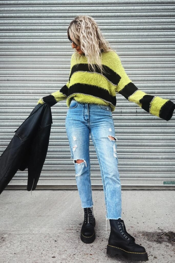 Green and Black Striped Distressed Sweater + Ripped Light Wash Jeans + Black Zip-Front Boots