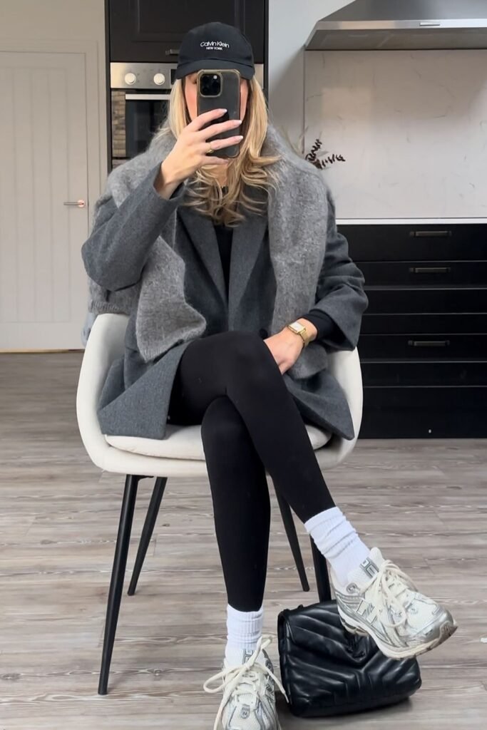 Grey Wool Blazer + Grey Sweater Over Shoulders + Black Leggings + White Sneakers with White Crew Socks