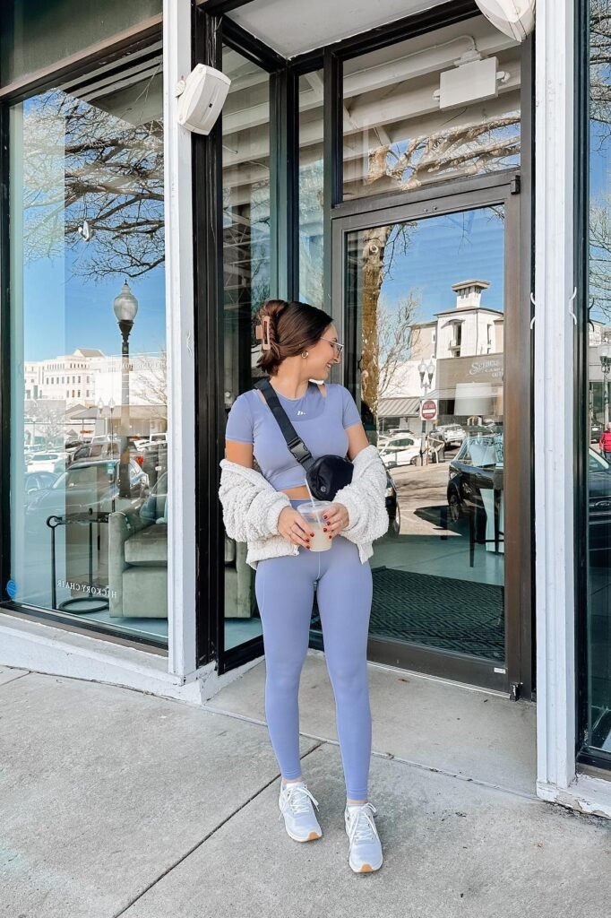 Lavender Workout Set + White Cropped Sherpa Jacket + Black Belt Bag + White Sneakers