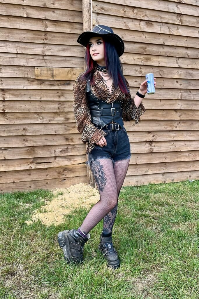 Leopard Print Blouse + Black Leather Underbust Corset + Black Denim Shorts + Black Fishnet Tights + Black Platform Sneakers