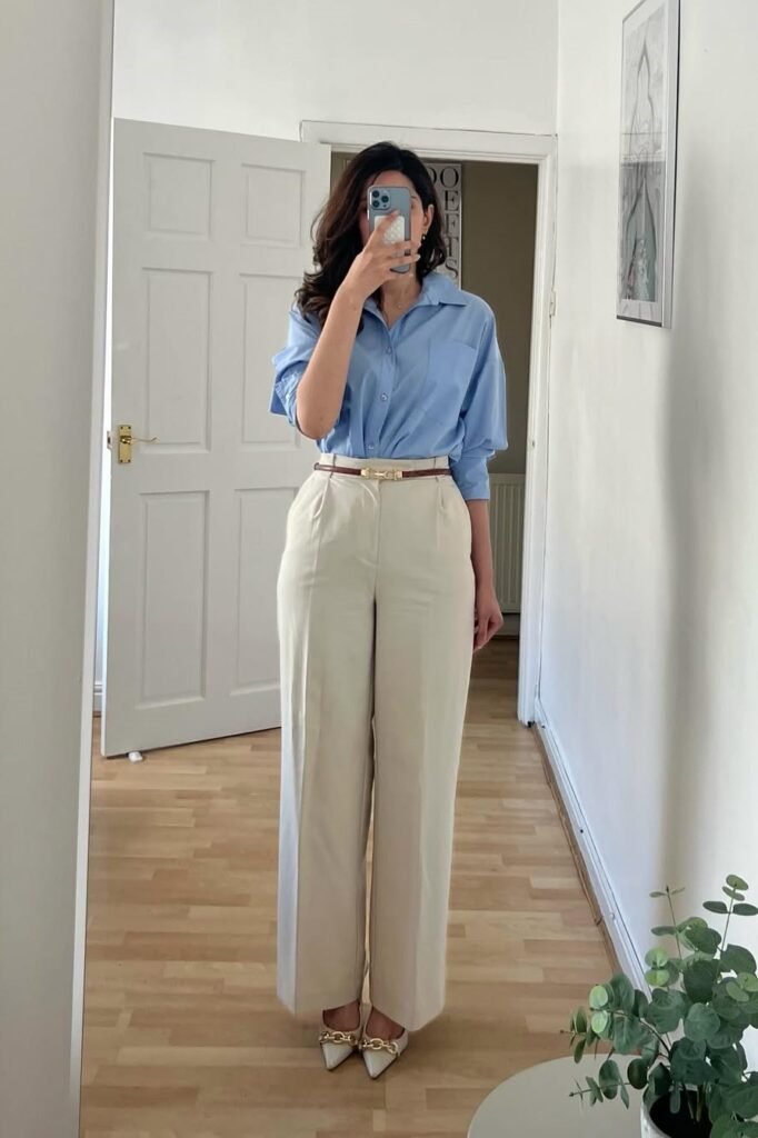 Light Blue Button-Down Shirt + Cream High-Waisted Trousers + White Chain-Link Heels