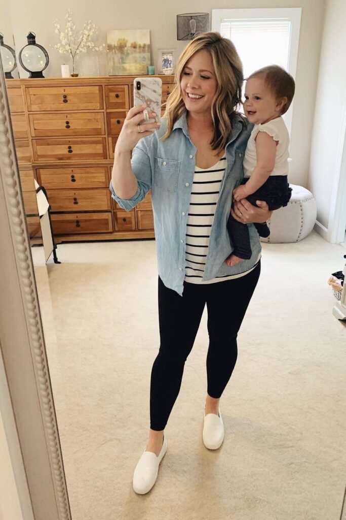 Light Wash Denim Shirt + Black and White Striped Top + Black Leggings + White Slip-on Shoes