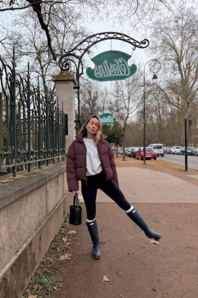 Maroon Puffer Jacket + Grey Crewneck Sweatshirt + Black Leggings + Tall Black Rain Boots with White Socks