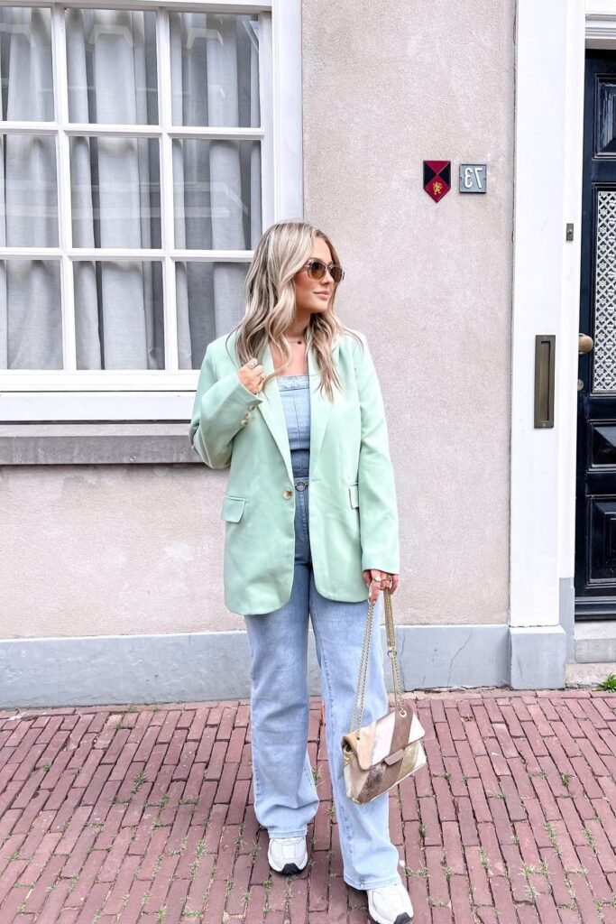 Mint Green Oversized Blazer + Denim Jumpsuit + White Chunky Sneakers + Metallic Gold Chain Bag