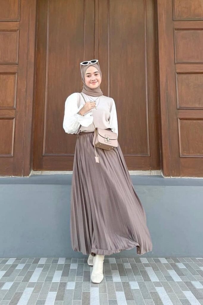 Mocha Hijab + White Long-Sleeve Blouse with Beige Vest + Mauve Pleated Maxi Skirt + Cream Ankle Boots