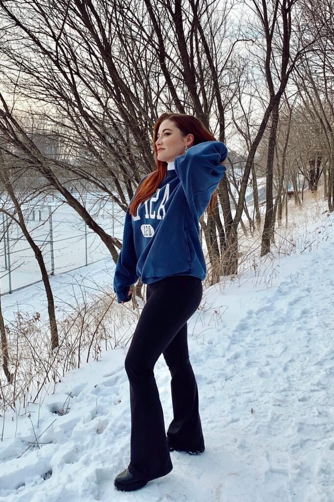 Navy Blue Graphic Sweatshirt + Black Flared Leggings + Black Platform Boots