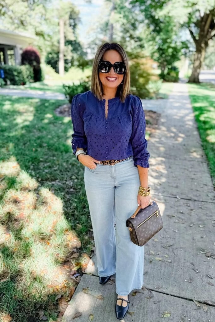 Navy Eyelet Blouse + Light Wash Wide-Leg Jeans + Leopard Print Belt + Black T-Strap Flats