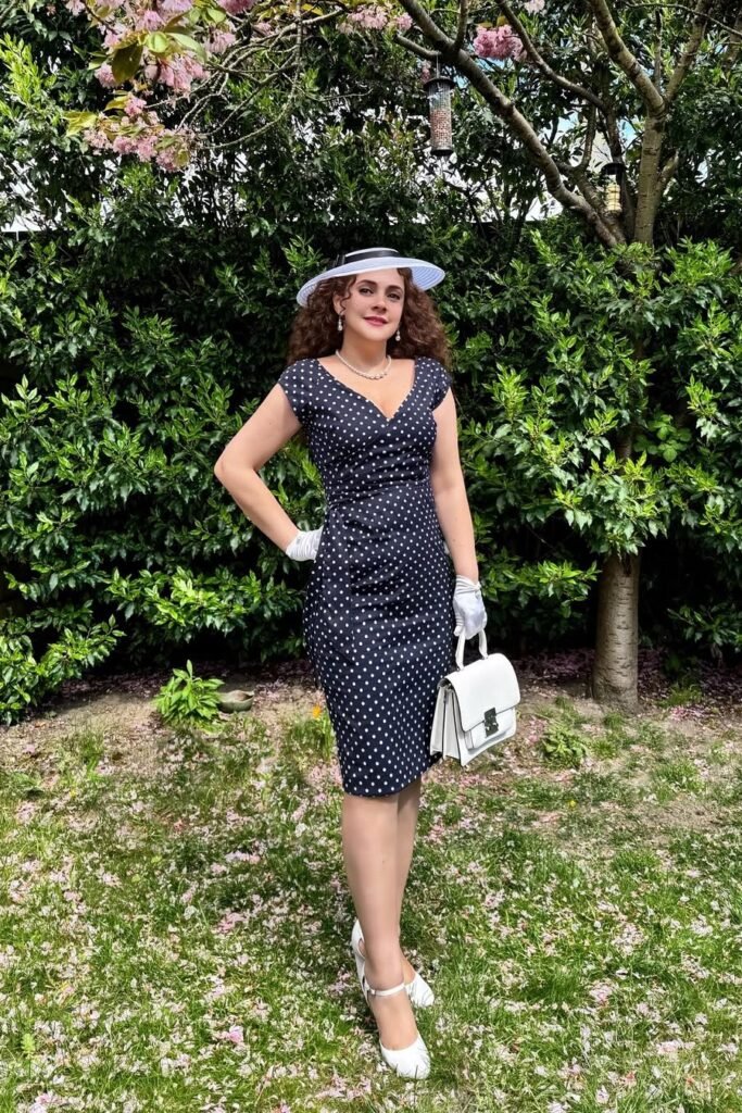Navy Polka Dot Faux-Wrap Dress + White Fascinator + White Gloves + White Mary Jane Heels