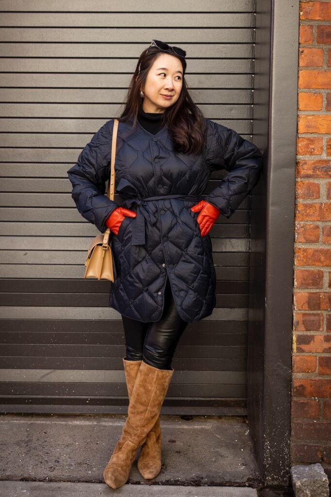 Navy Quilted Belted Coat + Black Turtleneck + Black Faux Leather Leggings + Tan Suede Tall Boots