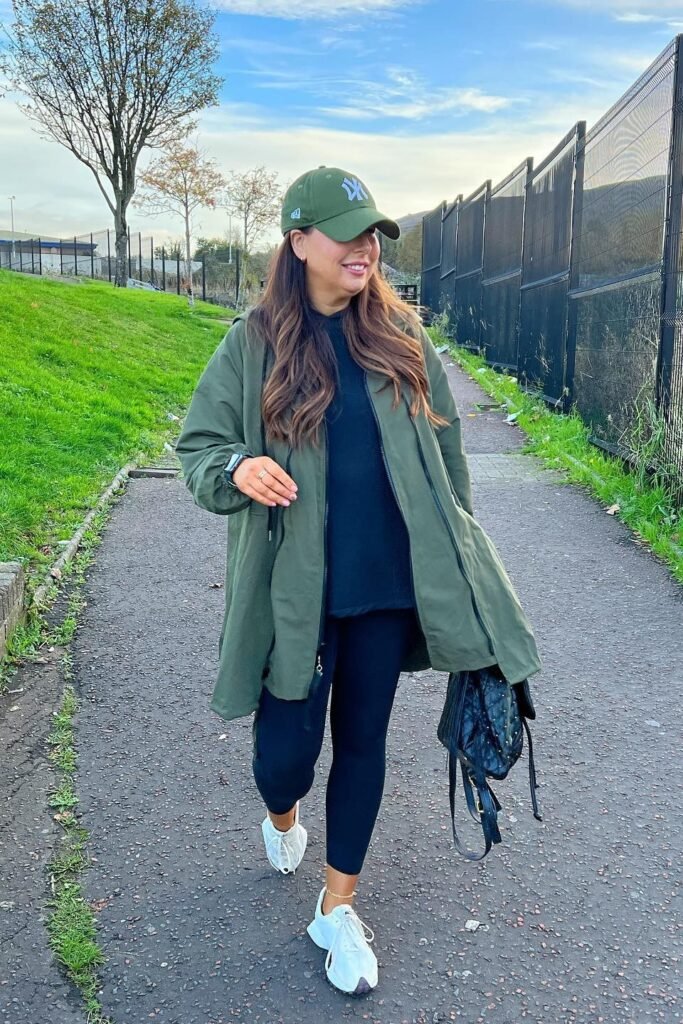 Olive Green Oversized Parka + Black Crewneck Top + Black Leggings + White Athletic Sneakers