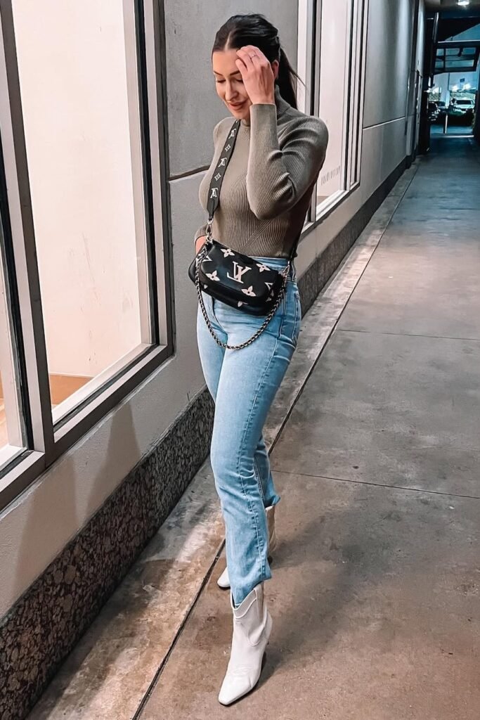 Olive Green Ribbed Turtleneck + Light Wash Skinny Jeans + White Western-Style Boots