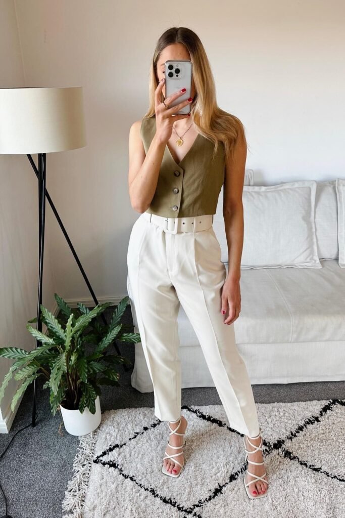 Olive Green Tailored Vest + Cream High-Waisted Trousers + White Strappy Heeled Sandals