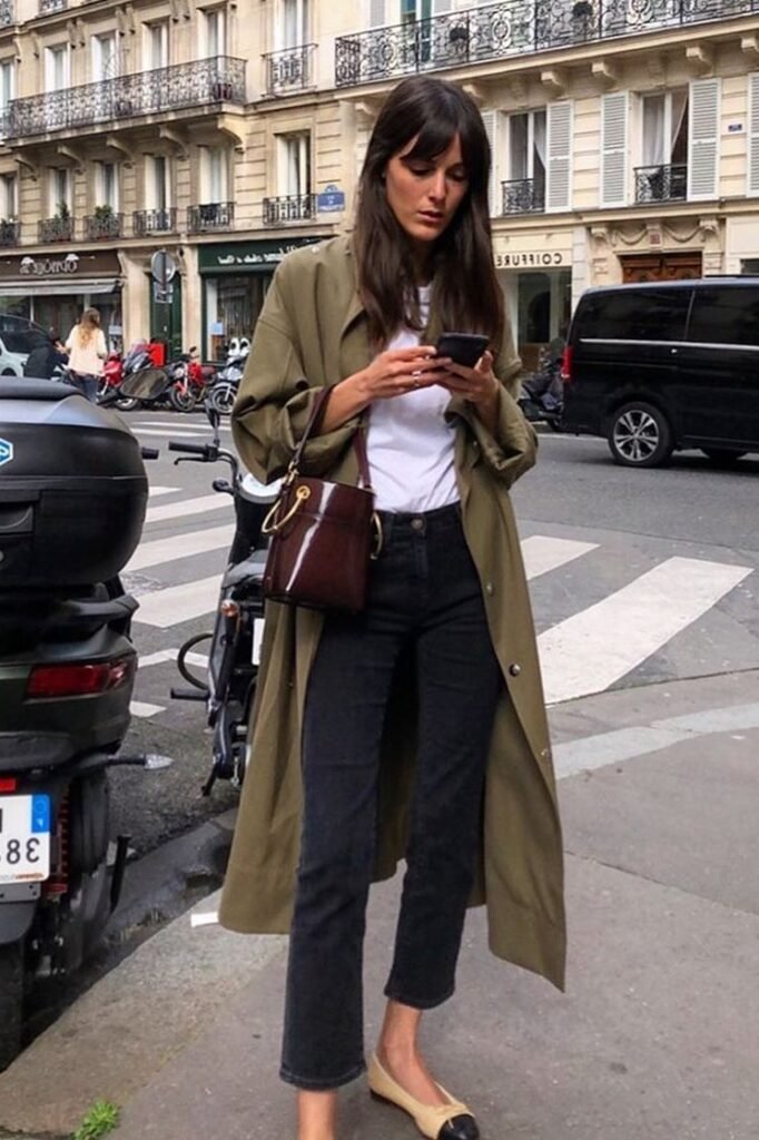 Olive Trench Coat + White T-Shirt + Black Straight-Leg Jeans + Two-Tone Ballet Flats