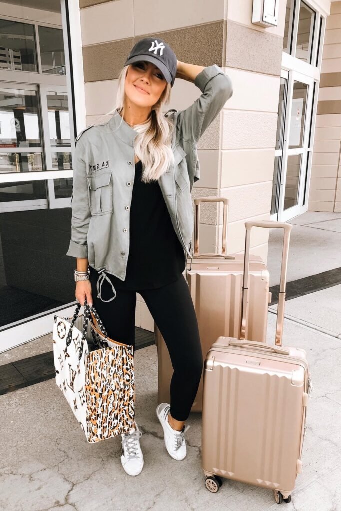 Olive Utility Jacket + Black Leggings + White Patterned Sneakers