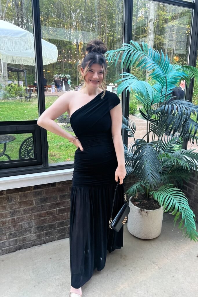 One-Shoulder Black Ruched Maxi Dress + Black Handbag + Gold Sandals