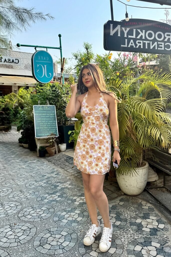 Orange Floral Halter Mini Dress + White Sneakers + Gold Watch