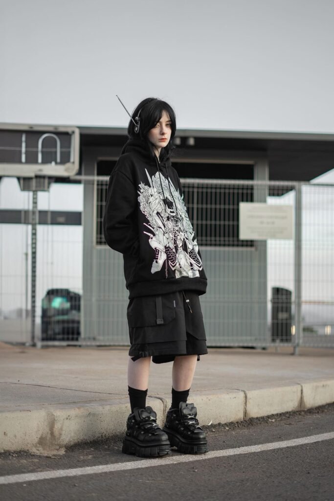 Oversized Black Graphic Hoodie + Black Multi-Pocket Cargo Shorts + Chunky Black Platform Sneakers