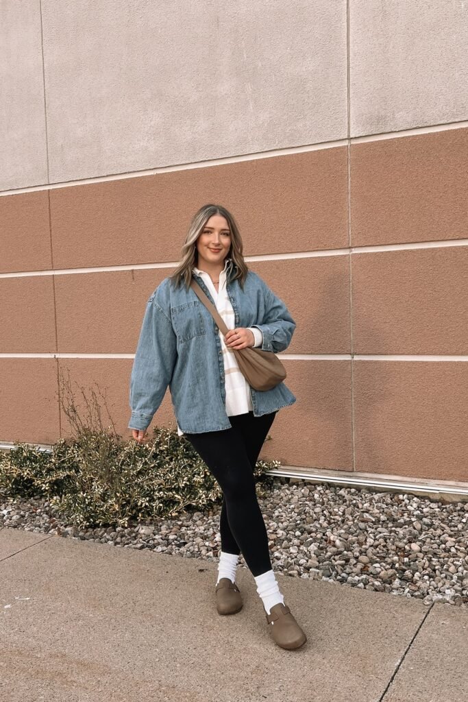 Oversized Denim Shirt + Striped Sweater + Black Leggings + Brown Mules