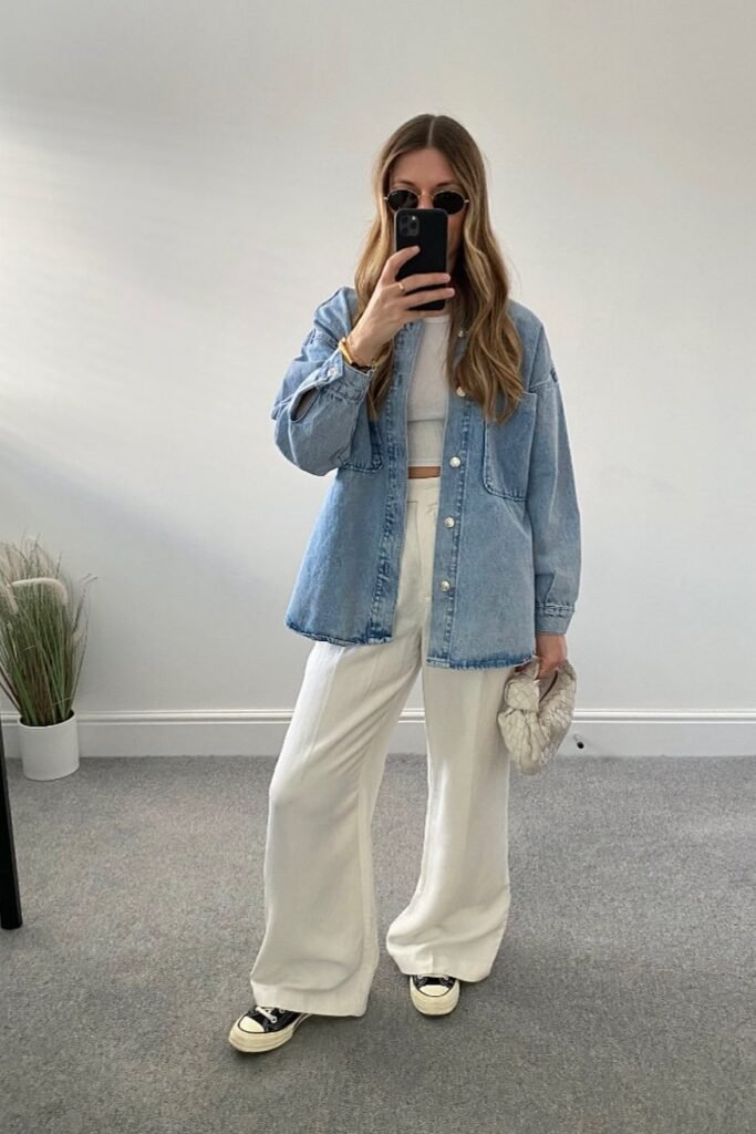 Oversized Denim Shirt + White Crop Top + White Wide Leg Trousers + Black and White Sneakers